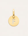 Charm Mini Medallion Letter Acero Baño Oro