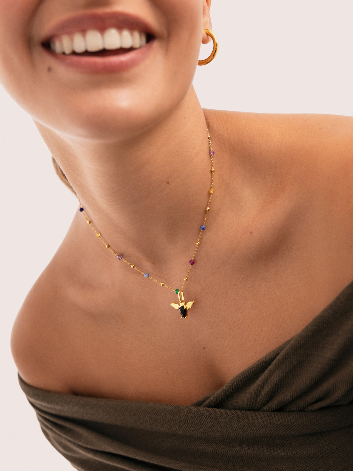 Charm Fledermaus vergoldet - puesto en modelo
