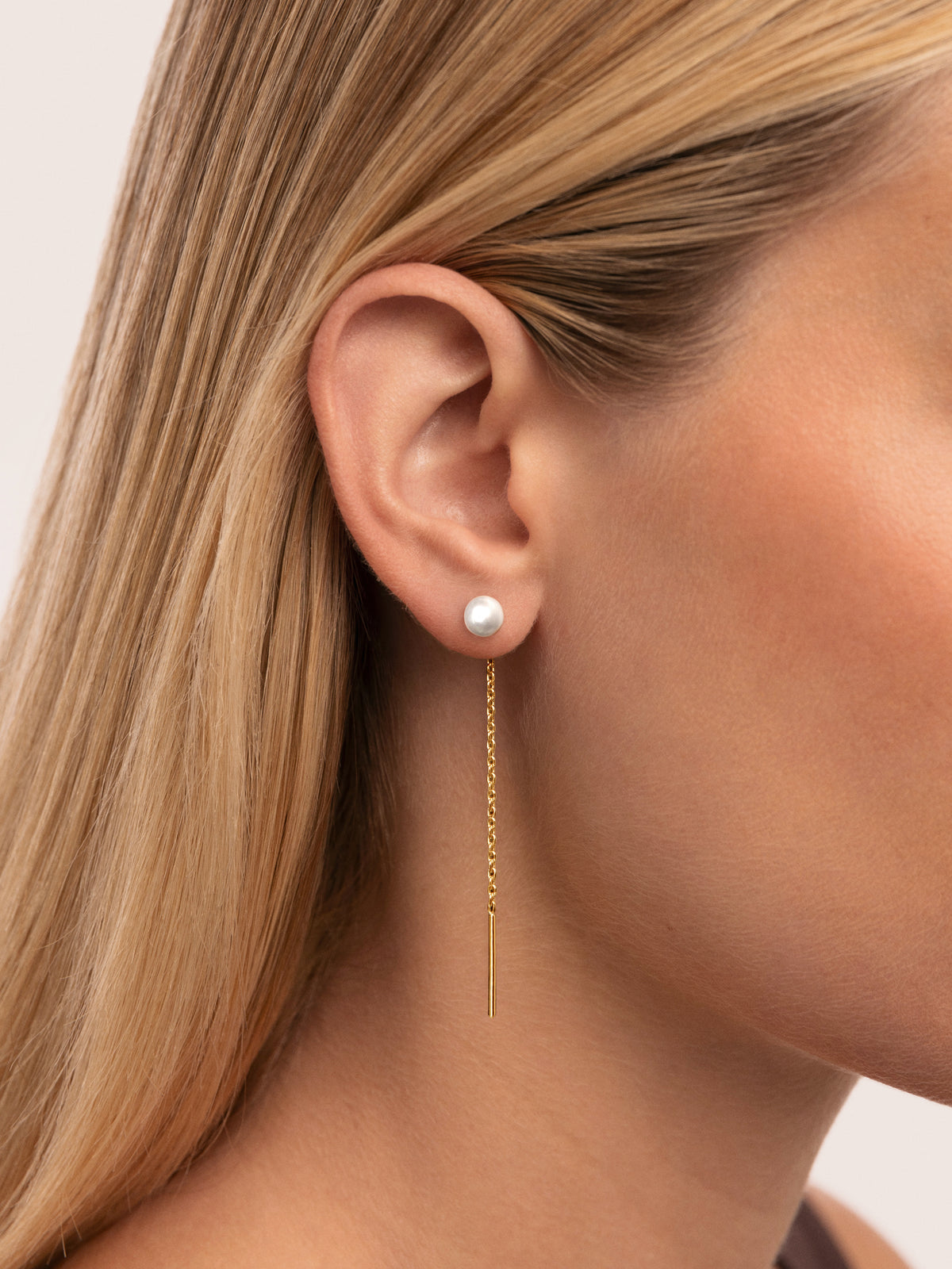 Falling Pearl Ohrringe aus Stahl mit 18-karätiger Goldbeschichtung